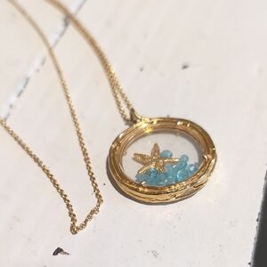 Gold Starfish Locket Necklace with Blue Accents